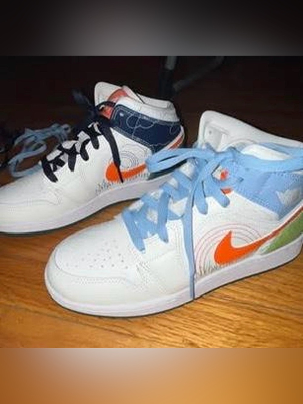 Jordan Kids' White Sneakers with Orange Swoosh and Light Blue Accents